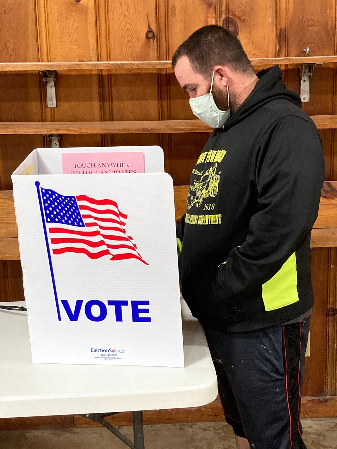Ryan Fry votes at the Montgomery County Fairgrounds Tuesday. Nearly 400 people had cast ballots in the 4-H Building by late morning.